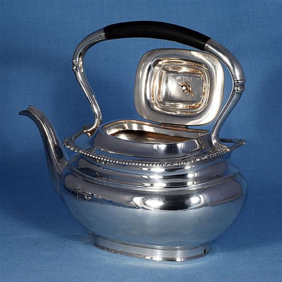 A silver kettle on stand, Height 12 ½”/318mm Width 10”/254mm., Weight 50oz/1418grms.